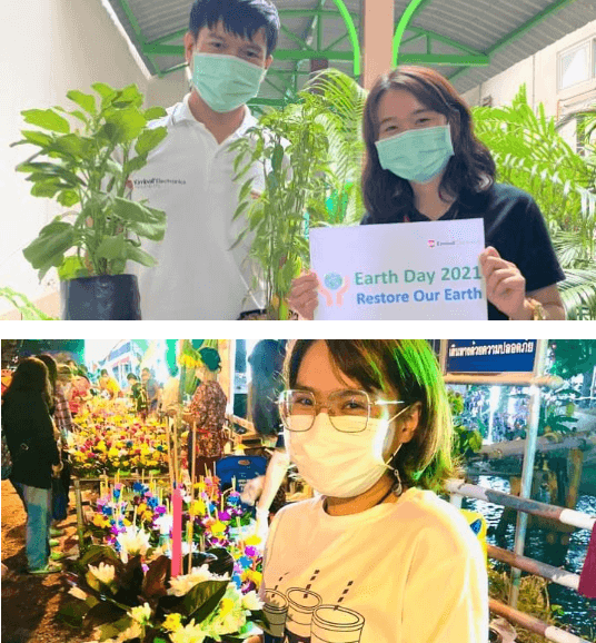 people holding plants celebrating world environemnt day
