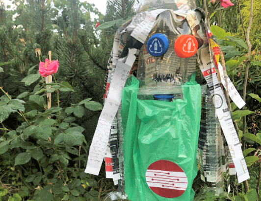 a trash scarecrow