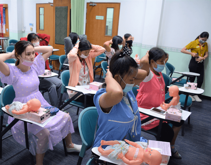 photo of asian women in child birth class