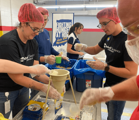 photo of people giving food