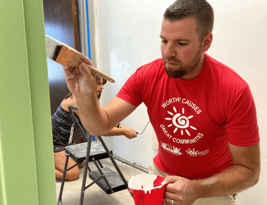 photo of a man and woman painting